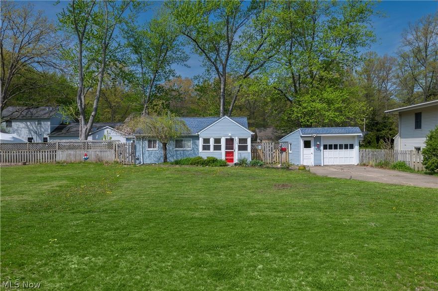 A rare find! Welcome to this charming ranch cottage located at 258 Vineyard in the highly desirable Vineyard Beach neighborhood of Avon Lake—just moments from lake access at Vineyard Beach Park. This prime location offers the best of coastal living, with nearby parks, walking trails, and stunning Lake Erie shoreline just a short walk or bike ride away.

Situated on a spacious double lot, this property stands out with its extra outdoor space—perfect for entertaining, relaxing, or future possibilities.

Step inside through the cozy enclosed front porch into a bright, efficient layout. The living room flows seamlessly into the dining area and beautifully updated kitchen, featuring crisp white cabinetry, modern hardware, granite countertops, and a deep farmhouse sink.

The home offers two comfortable bedrooms and a full bath with clean, modern finishes, making it truly move-in ready.

Outside, enjoy the expansive yard, charming landscaping, and a deck that opens to a private green space—perfect for gatherings, a firepit, or simply unwinding.

Located near Sunset Park, the Avon Lake Public Library, the Aquatic Center, and a variety of local shops and dining options.

Whether you're a first-time buyer, downsizing, or looking for a smart investment, this property offers outstanding value in a sought-after lakeside community.

Don’t miss your chance—schedule your private showing today!