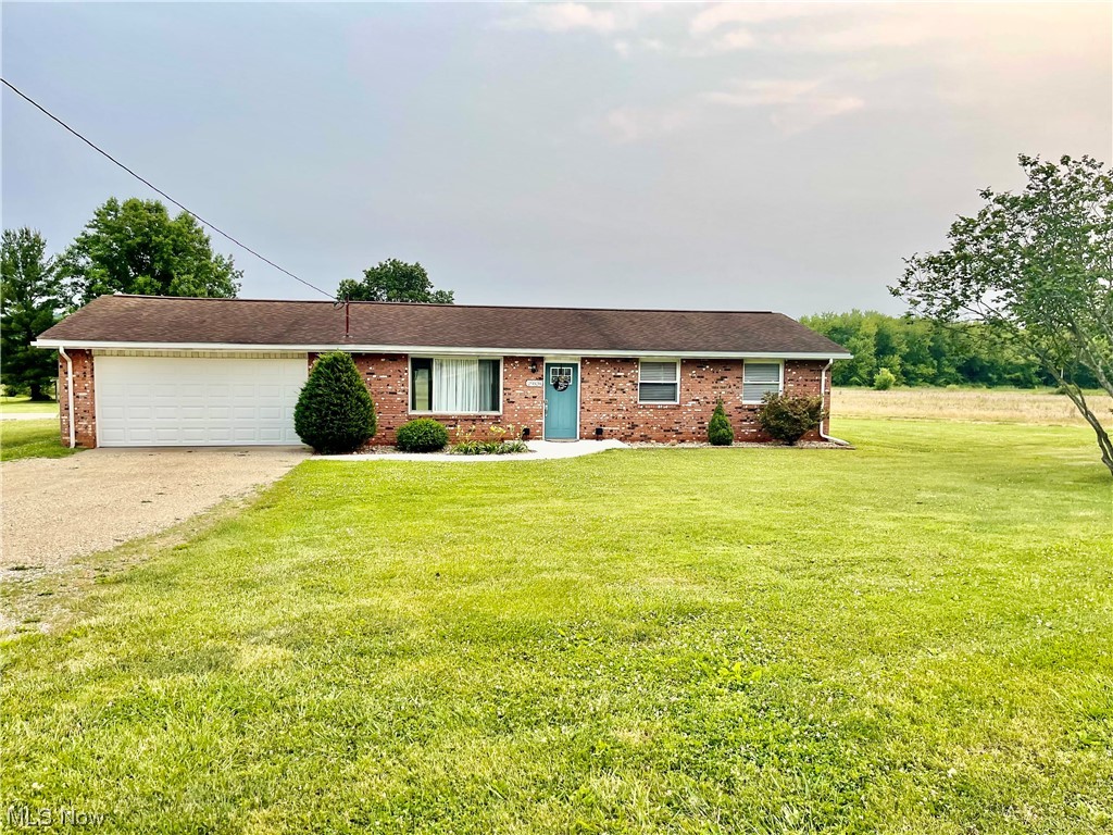 Here’s the one you’ve been waiting for! Completely remodeled and updated brick ranch on a level lot only minutes from town! This home has been beautifully remodeled from top to bottom! Move right into this stunning, one level, open floor plan home! All brand new in 2017- HVAC, duct work, plumbing, kitchen cabinets, kitchen appliances, countertops, bathroom fixtures, flooring, lighting- ALL UNDER 5 years old! The backyard is huge with so much potential for entertaining or building that dream garage you’ve been wanting. Don’t wait- this one won’t last long!
