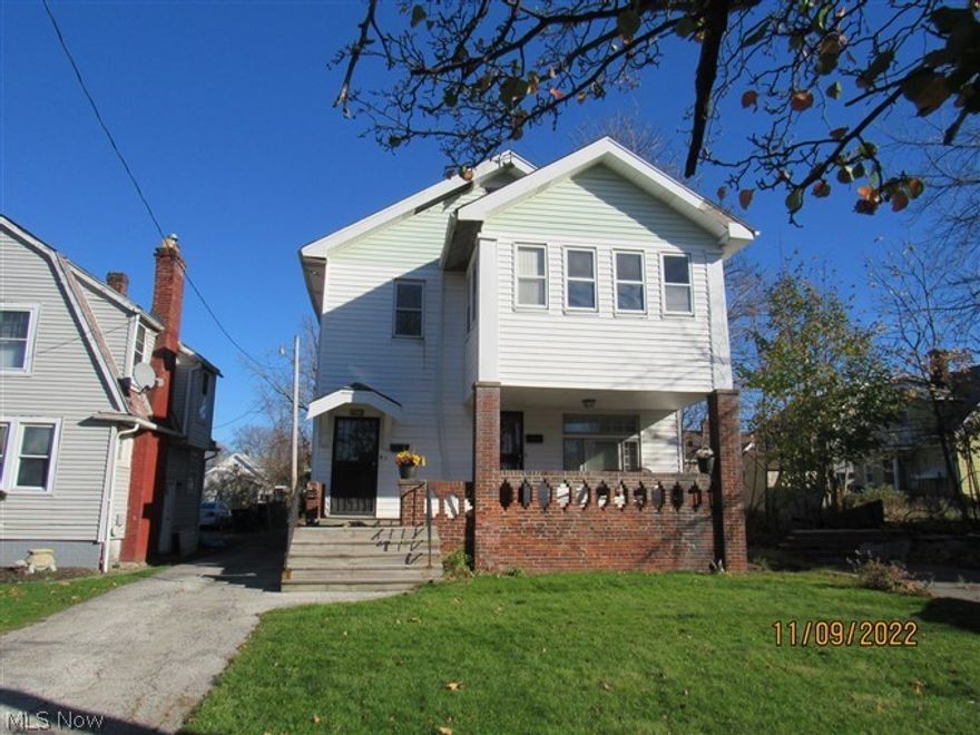 Great opportunity for investment!  There are 2 units that could be used to rent out.  You could live in one and rent the other out.  It is close to all amenities.  There are some newer vinyl windows.  There is a large 2 car detached garage.  There is natural hardwood floors throughout.  Come and see.