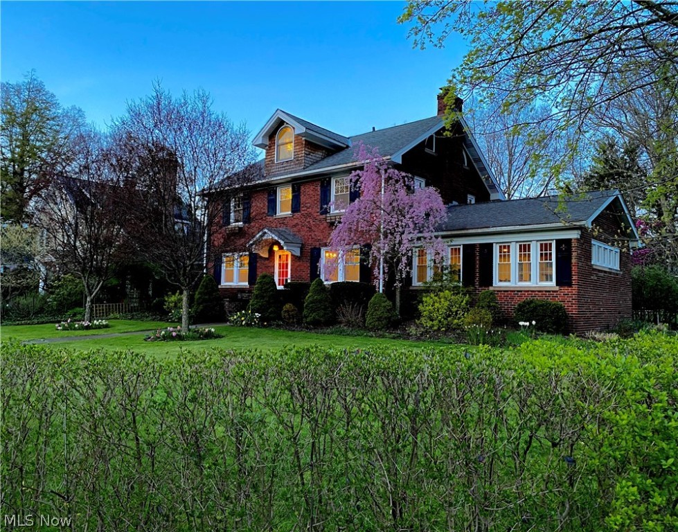 Immaculately updated center hall brick colonial home in the heart of Cleveland Heights. Unlike any other home currently on the market, this five (5) bedroom two and a half ( 2.5) bathroom has it all. The updated chefs kitchen is a true masterpiece with cherry cabinetry , stone backsplash, granite counter tops and top of the line stainless appliances. The first floor also boasts a large formal dining room, a large formal living room with built in book shelves and a fireplace which opens to an enormous 20x20 family room with windows surrounding three sides of the room. The second level has 3 large bedrooms and an updated full bathroom. The cavernous 24x14 master bedroom is truly a private escape! The third floor features 2 additional bedrooms and a newly renovated full bathroom. The home has 2 separate heating systems, a newer boiler and high velocity central air conditioning. The exterior is truly one of a kind. The home is situated on just under 1/2 acre of land and has a completely pr