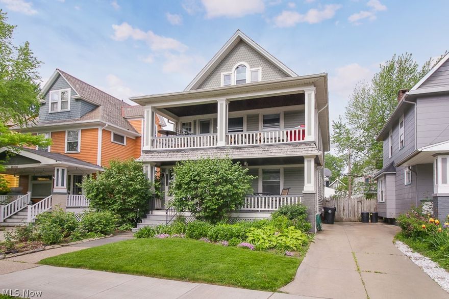 Welcome to this well maintained classic colonial double near the Gordon Square Arts District! Walking distance to some of the most popular restaurants and attractions in the entire city. Two oversized units, one up and one down. Loaded with charm, each suite has 2 bedrooms, living room, dining room, kitchen, and bath. Upstairs unit boasts a spacious fully finished 3rd floor! Appliances including washers/dryers will remain. Charming built-in cabinets in dining rooms and hardwood floors throughout the living, dining and bedrooms. Outside you have plenty of choices to pull up a chair and relax on the large front porch, back porch, or around the firepit in the deep fully fenced backyard. Huge full basement for laundry area, flex space and extra storage. Live in one unit while renting the other for extra income or keep both rented for fantastic income property. Ideal location near shopping, restaurants, parks, Lake Erie, Downtown Cleveland, public transportation, and highway access. This lo