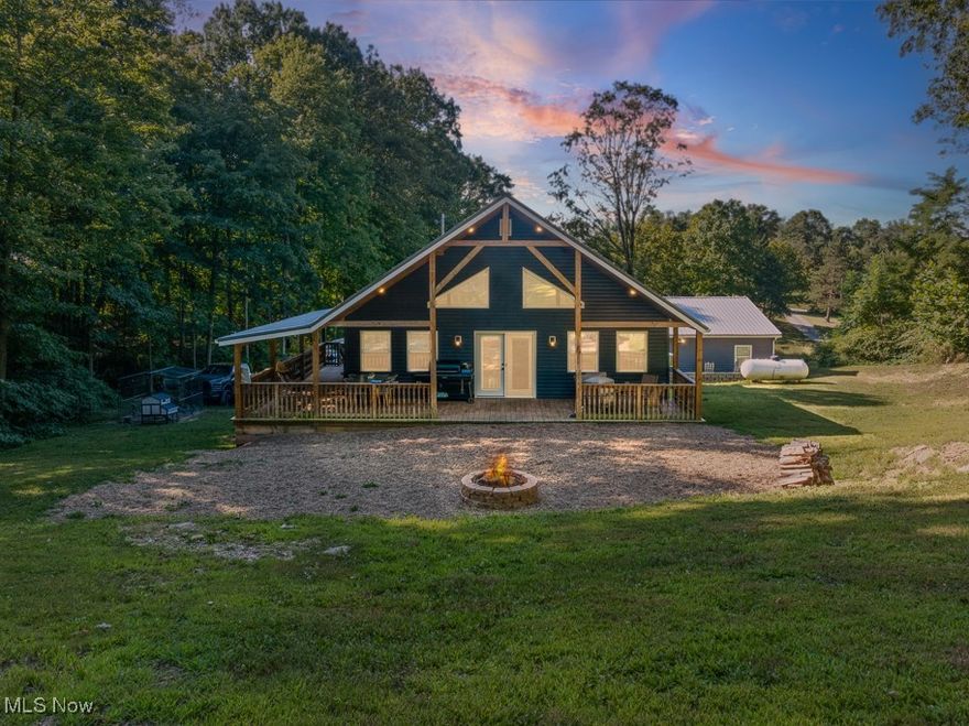 Welcome to your own private paradise. Built in 2019, this one-of-a-kind A-frame style ranch with a walkout basement sits on 3.58 scenic acres. The property features a serene backyard pond with a stunning rock wall and a wrap-around covered porch with recessed lighting, perfect for relaxing or entertaining. Inside you will find an open concept floor plan with vaulted ceilings, exposed wood beams, and abundant natural light. The kitchen offers quartz countertops, a large island, and plenty of space for gathering. The loft provides a versatile area that can serve as a third bedroom, office, or hangout space. The main floor includes the master suite with full bath, as well as an additional bedroom and full bathroom. The oversized garage is finished and designed for more than just parking. It includes a bar, pellet stove, 125-amp service, concrete floor with drain, and ample space for projects or entertaining. Additional features include a spray aeration system, propane furnace and stove with the remainder of the home powered by electric. Mineral rights do not convey with the property. This home offers the perfect balance of peaceful country living and modern comfort. Do not miss the opportunity to call it yours.