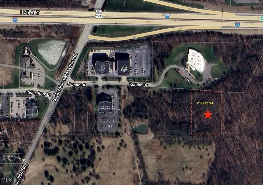 Perfect location to interstates and travel. Situated in a really nice business park and next to a prestigious Signatures of Fairlawn office building.  Would be perfect for medical building. Can be zoned mixed use medical offices.  Great exposure on 21 and Kumho Drive.  Currently zoned residential but would be best suited for a zoning change and perfect for another office building.  Additional land available for sale.