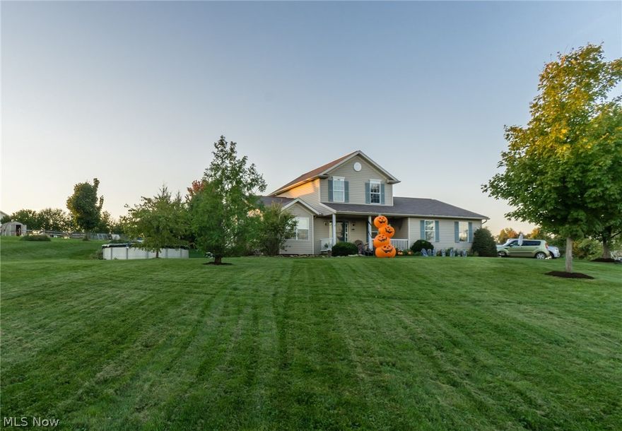 Let these country roads lead you home. This lovely 3 BR, 2 1/2 bath home is looking for a new owner just in time for the holidays!  It offers over 2700 sq. ft.  Upon entry a spacious foyer will greet your guests.  This is all open to a relaxing great room with a stone fireplace.  There's room for everyone in the kitchen. Sit at the breakfast bar or sit in eating area.  Custom cabinets with space that will please any chef with a pantry.  From there use the sliding glass doors and step down to the patio to grill and entertain.  1st floor master BR featuring master bath you have been dreaming with an alluring large closet. The new owners 2.4 acres including an 18' above ground pool.  Everyone will be able to appreciate the 2 car attached garage as well as the heated detached garage that measures 24x30.  Partially finished 13 course basement that is perfectly suited for an office & room for hobbies of your choice.  This is a farmer's paradise with main garden 30x90.  The small orchard has