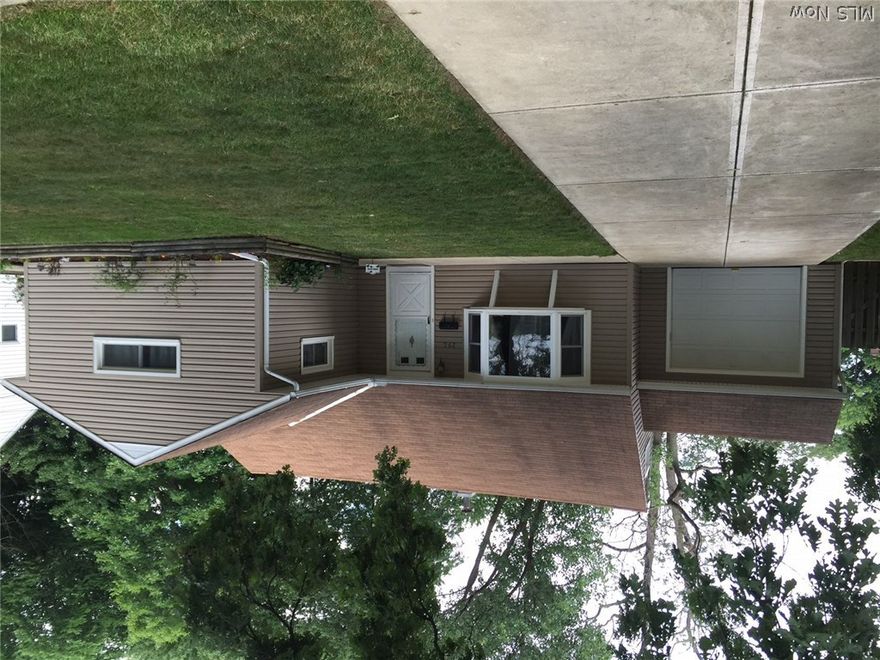 Beautiful Berea Bungalow has 4 bedrooms, large eat-in kitchen, 3 season room, den with gas fireplace and built-ins, bay window in living room, patio, fenced in yard.  Close to everything in Berea.  Newer carpet throughout.  Seller is expecting so 24 hour notice please.