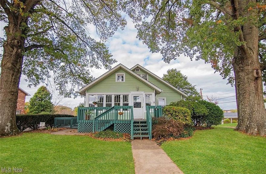 There’s something special about 5807 4th Avenue…it is a home you want to go home to. This property has been lovingly updated and restored to reflect modern comfort while keeping its character intact.
If these freshly restored hardwood floors could talk, they’d tell stories of joy, gatherings, and a home well loved. Sunlight pours through the many windows, dancing across the warm wood tones and filling each room with a cheerful glow. The sunroom is a favorite spot…the kind of place where mornings begin with coffee and evenings wind down with a good book. The home has been updated with fresh paint and new light fixtures throughout. Even the ceilings were given attention…carefully scraped, patched and painted to perfection to bring the home up to modern standards while preserving its charm. 
The formal dining room feels made for Sunday dinners, while the kitchen’s cozy fireplace adds both warmth and heart to the space. There are laundry hook ups on the main level in kitchen! With two bedrooms and a fully renovated bath on the main floor, plus two large bedrooms upstairs with new carpet and fully renovated bathroom upstairs as well. Both bathrooms were totally redone with electrical and plumbing updates. This home has been thoughtfully curated to blend modern style with lasting quality. 
Outside, a wrap-around deck invites you to slow down and enjoy the day. The large unfinished basement offers abundant storage or potential for a future workshop, and the one-car garage adds convenience. The HVAC is 3 years old and has recently been upgraded with additional ductwork to extend to the second floor. 
Situated on a corner lot in the heart of Vienna, this gem is located in the highly desired Greenmont School District, just minutes from parks, restaurants, and major shopping. A beautiful mix of craftsmanship, comfort, and convenience…This home has had over $50,000 in updates and is available for immediate possession!