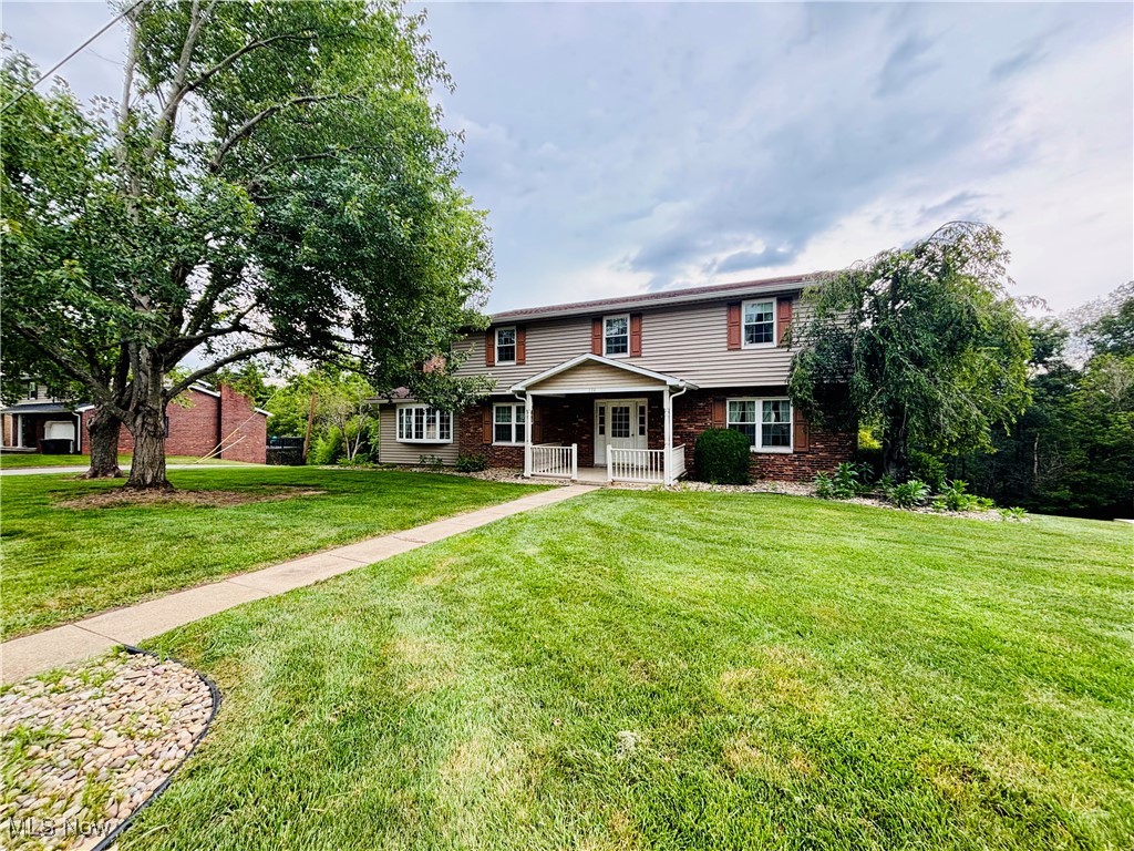 Welcome to 224 North Hills Road - a spacious 4-bedroom, 3-bathroom home on a corner lot. This home features include a large yard with mature trees, formal living room and dining room, and an eat-in kitchen! The large great room features dark wood beams, a cozy fireplace, and access to the back deck, ideal for entertaining. The master suite includes a private bathroom and walk-in closet. With over 2,500 square feet of living space, this home combines comfort, space, and location! Great layout with plenty of space inside and out!