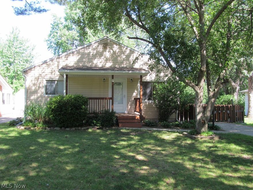 Immediate possession! Easy to show! Turn the key and move in! Kitchen was updated in 2005 with glass back splash. Formal dining room features newer flooring. Large living room. Owner suite boasts wide closet. Bedroom 2 has two closets. Large laundry room includes extra space to add another full bath. Large fenced in yard features a covered deck. 2 car garage with attached shed/workshop.  All kitchen appliances and window treatments stay. Walk to Midpark Jr. High School. Garage door 2013. Updated full bath 2010.  Breaker box, patio, driveway, fence, and deck updated in 2005. 1 year HMS Home Warranty.