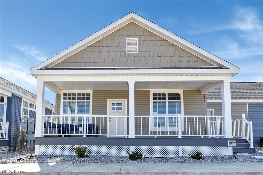 INVESTMENT OPPORTUNITY!! This newly constructed villa is fully furnished and available for immediate occupancy with lucrative income potential. Area zoned business, active on AirBnB and any existing reservations will transfer to the new owner. This BRAND NEW development on the shores of Lake Erie is adjacent to Bay Point Resort. A year-round resort life awaits with our 1-story Ranch offering 3 bedrooms 2 baths, attached 1 car 12 x 24 garage and full 8 x 26 front porch. Clubhouse features an event space, fitness center, locker rooms with saunas and pool. Bay Point social membership is required. Bay Point is a Private Resort with a sandy beach, Shores Club restaurant, Tiki bar, Marina Market/Store, 805 slip marina and Gas Dock. Easy access to both the Lake and Sandusky Bay.