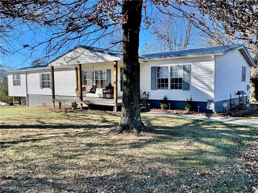 Back On Market, No fault of house.   Beautiful 2.75 Acre Lot with fruit trees, apple, pear, peach, and blueberrys. Wonderfully updated 3 bedroom and 2 full baths with first floor laundry. Inviting front and back porches overlooking your flat yard. Full Basement.