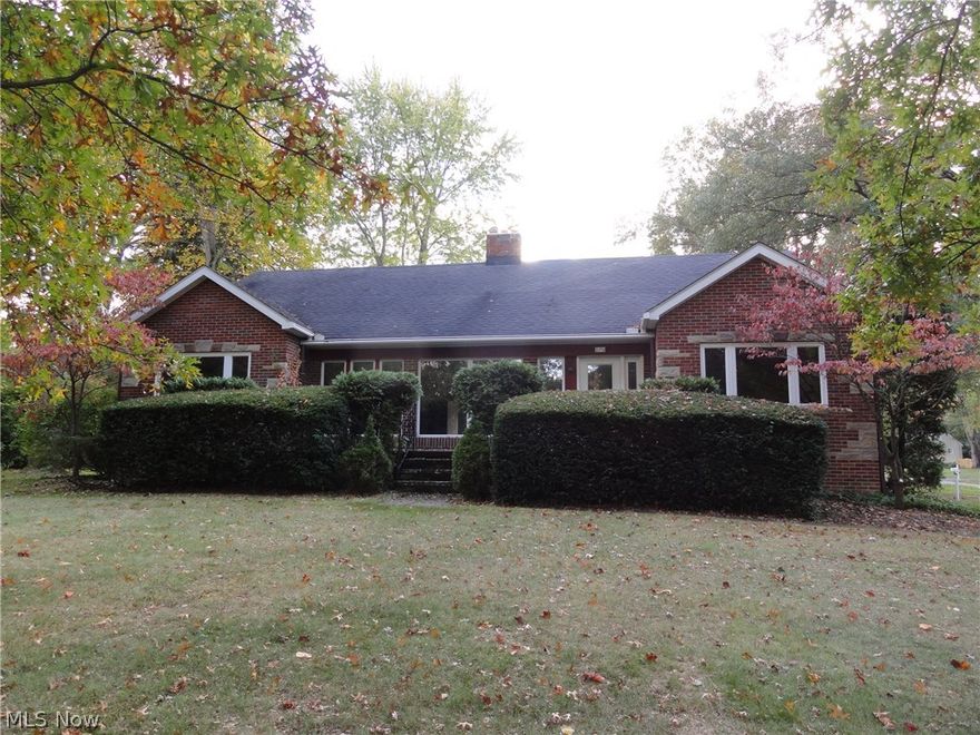 Sprawling brick ranch/cape  situated on 1/2 acre in beautiful Fairlawn Heights. Spacious rooms throughout include a formal living room brightly lit with windows across the front. Formal dining room that steps out to a sun room. Eat in kitchen with a new laminate floor, stainless refrigerator and dishwasher, plenty of cabinets and an island with a breakfast bar. Two large bedrooms and a full bath on the first floor and two more large bedrooms and a full bath on the 2nd floor. Hardwood floors throughout, even under the carpet. Most all windows are newer too! Huge rec room with fireplace and a 3rd full bath. Two car garage leads into the kitchen  by a spacious breezeway. This home has been carefully maintained and it is neat and clean throughout.