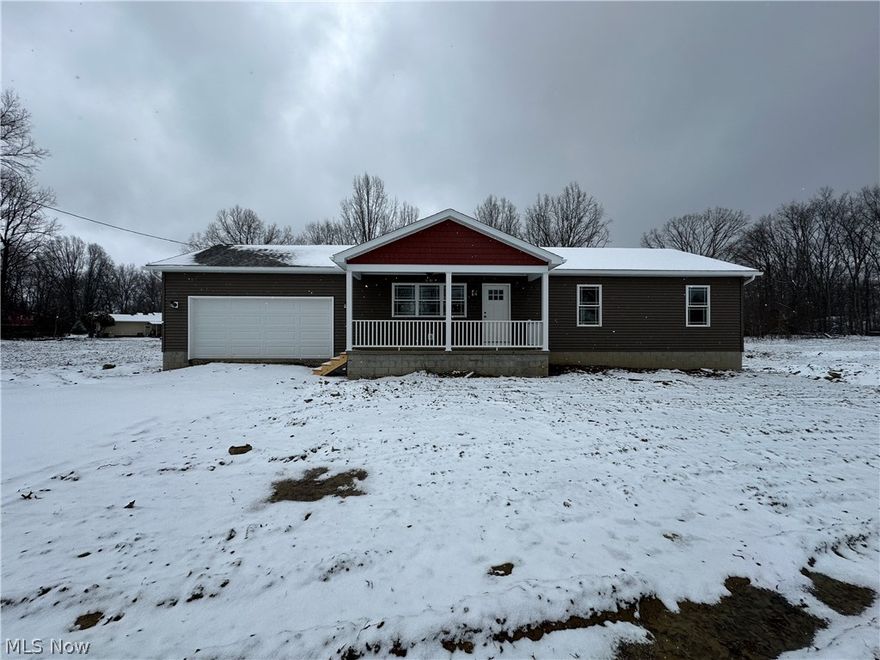 This newly constructed 1,206 square foot, three-bedroom, two-bathroom ranch home features a front porch, spacious open concept living, dining, and kitchen area, single-level living with first-floor laundry, and an attached two-car garage. The full basement is both waterproofed and insulated. Refrigerator, range, microwave range hood, dishwasher, washer, and dryer are included with purchase. Concrete driveway installation and grading and seeding of yard to be completed by builder as soon as weather allows. 

This home has a 15-year 100% property tax abatement on all improvements and is eligible for the City of Youngstown's $10,000 down payment assistance program.

Purchase of this home is limited to income-eligible buyers who commit to owning and occupying the home.