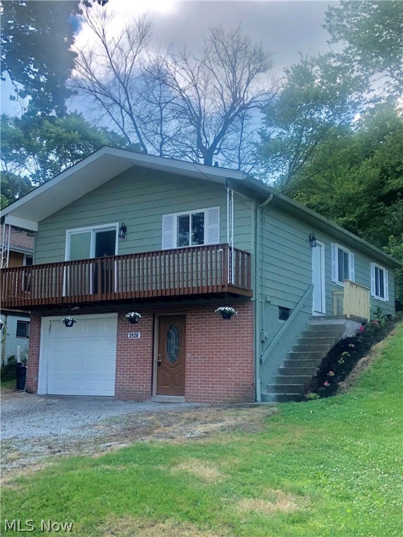Here it is!! The weekend lake house or year round nest. A short walk from the dock and playground at Springfield Lake in the quaint Village of Lakemore. This nicely updated ranch sits on its perch with beautiful sunset views from the outside deck. The main floor features fully renovated kitchen with all new cabinets and appliances, butcher block counters, new flooring, 3 Bedrooms and updated bathroom and don't miss the newer windows and new light fixtures throughout. The lower level (not included in square footage) was also updated adding additional useable space with inside access. From the outside you can enter directly into the lower level entrance to find the perfect mud room with fresh paint and plenty of space to keep your bikes, fishing gear, kayaks and toys. Behind this is a separate bonus space, a large rec room great for a kids' playroom, man cave, crafting corner or whatever your special need or desire may be. The left side offers the single car garage, separate laun