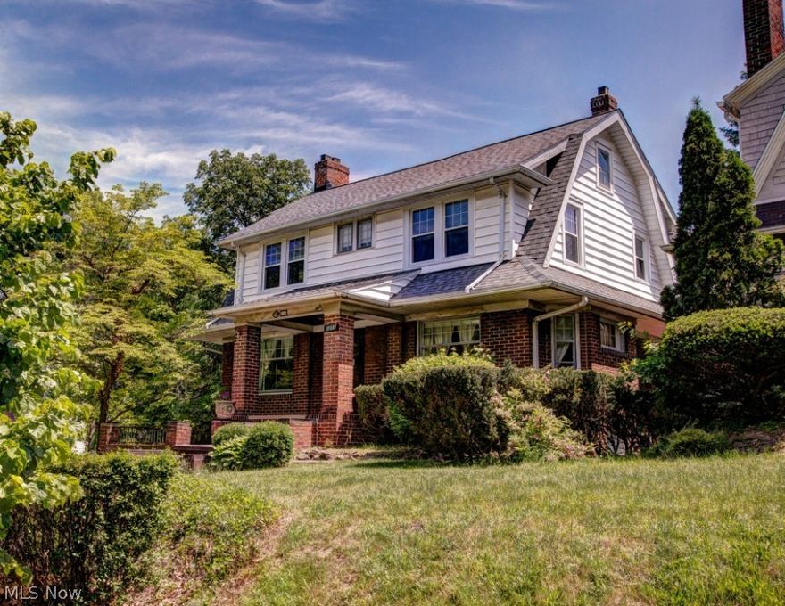 This is a wonderful opportunity to live in a quiet neighborhood of Cleveland Heights! This colonial has such great curb appeal with its brick & stone façade & grand front entrance. A stone retaining wall surrounds this beautiful corner lot. Stone stairways lead to both the front and back doors. Stone patio in back for entertaining! Spacious living room with a fireplace! Original Hardwood doors & flooring throughout bring out the charm of this 1920's home! The recently updated dine in kitchen has a newer cabinets, granite kitchen countertops & all the appliances stay! Formal Dining Room! Three spacious, sunny bedrooms all have large closets. Large master bedroom has a sitting area & access to the upstairs screened porch. Third floor finished attic space would make for a great play room. Newer Boiler! Furniture is negotiable. Complete tear off & brand new roof w/lifetime warranty on the shingles, 15 year warranty on the labor! This home is City of Cleveland Heights Point of Sale Violatio