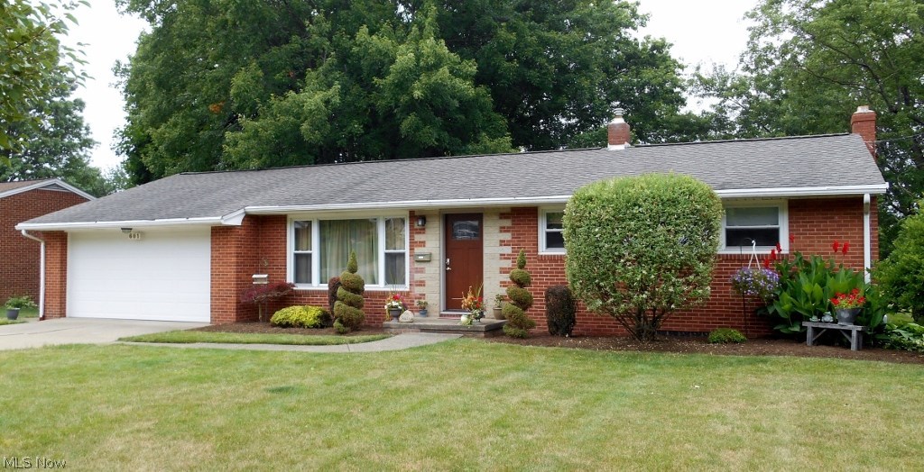 Welcome to this move in ready 3 bedroom 2 bath brick ranch home with a 2 car attached garage. The remodeled eat in kitchen has stainless steel appliances and opens to an inviting 3 season room with tree top views. The large living room and 3 bedrooms have new carpet and all have hardwood floors underneath. The lower level has an additional 350 Sq.Ft. of living space with a beautiful full bath and possible 4th bedroom currently being used as a family room, also plenty of storage and a walk out to a large level backyard. The backyard has a storage shed equipped with water and electric convenient for gardening plus a separate playhouse. Other upgrades include 2008 roof, windows and gutter guards, 2009 insulated garage door, 2014 sunroom windows and sliding door, 2016 new front door. Gas budget was $49 last year with the final 3 months free. Home warranty included.