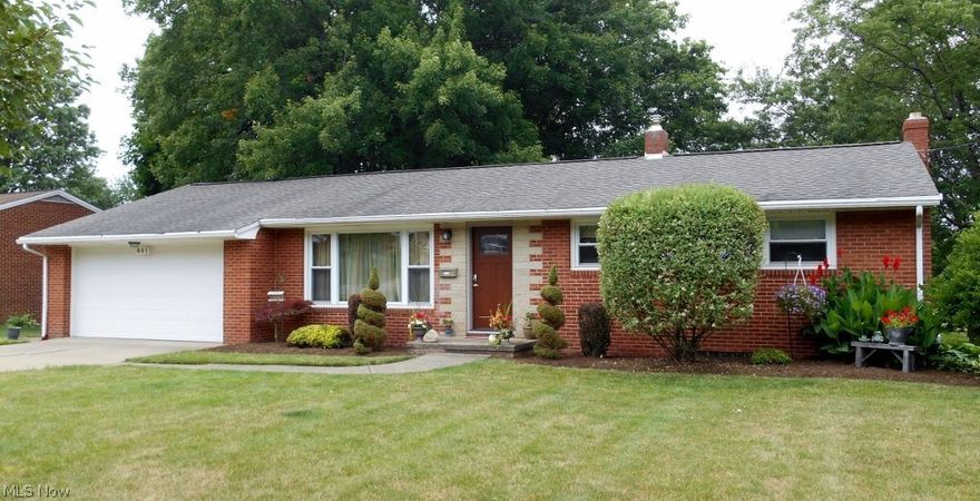 Welcome to this move in ready 3 bedroom 2 bath brick ranch home with a 2 car attached garage. The remodeled eat in kitchen has stainless steel appliances and opens to an inviting 3 season room with tree top views. The large living room and 3 bedrooms have new carpet and all have hardwood floors underneath. The lower level has an additional 350 Sq.Ft. of living space with a  beautiful full bath and possible 4th bedroom currently being used as a family room, also plenty of storage and a walk out to a large level backyard. The backyard has a storage shed equipped with water and electric convenient  for gardening plus a separate playhouse. Other upgrades include 2008 roof, windows and gutter guards, 2009 insulated garage door, 2014 sunroom windows and sliding door, 2016 new front door. Gas budget was $49 last year with the final 3 months free. Home warranty included.