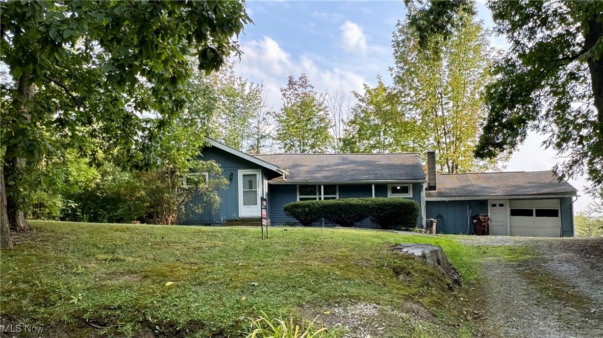 Attention investors and handypersons! Here’s a fantastic opportunity to renovate a 1,278 square foot ranch home featuring 3 bedrooms and 1.5 baths, situated on a wooded acre in Newbury. The large living and dining area is combined, and the kitchen has wood cabinets with granite countertops. All electric heat; however, there is natural gas at the street. This property is situated on a cul-de-sac street within the West Geauga School District and is conveniently close to Punderson State Park. Don’t miss out on this one! Being sold as is.