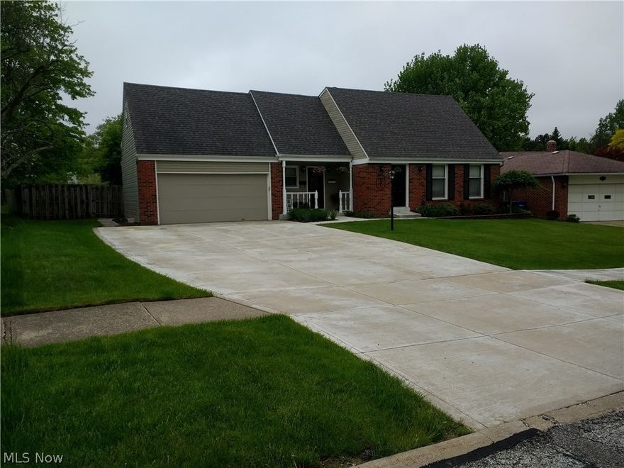 Everything you could want and more! Spectacular home inside and out! Beautiful eat in kitchen with open concept has room for large family or entertaining. Center island for extra seating and storage. Tons of cabinetry.  Family room has gas fireplace and sky light. Custom built entertainment center is negotiable. First floor laundry! Half bath on the first floor also!! Bedrooms are spacious. Master bedroom has full bath with stand up shower. Main bath has tub and sliding barn style door. Finished rec room in the lower level. Lower level beauty salon can stay or go. Beautifully landscaped totally fenced in backyard. Deck with pergola is 34x14. 
Roof replaced with tear off 2011. Driveway 2010. Furnace & c-air 2011.