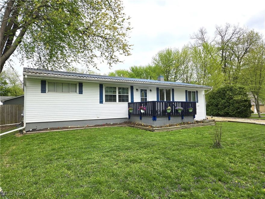 Welcome to this move-in-ready, four-bedroom, 2-full-bath, updated ranch with finished basement, 3-season room, and 3-car garage, sitting on a corner lot encompassing over a quarter acre!  Enjoy outdoor life on the front porch or out back on the deck with a fully fenced-in yard. Metal roof!  All appliances included! Close to amenities with a 2-minute drive to the beach at Madison Township Park and local restaurants, and 8 minutes to local shopping/restaurants!