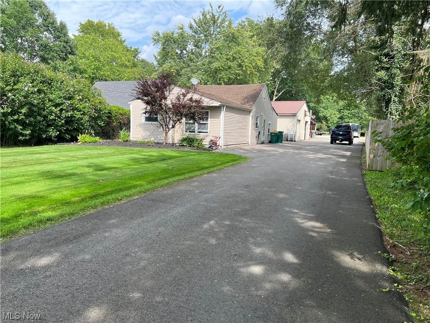 Make yourself right at home and enjoy first floor living!  This property has far too many updates and upgrades to list them all but some of the major improvements include Pella sliding glass door and tankless water heater completed in 2020.  In 2021 the asphalt driveway was poured, as well as cabinets, sink, microwave and oven all being replaced.  Upgrades in 2022 include new vinyl plank flooring, carpeting, trim and molding, bathroom renovated, washer and dryer replaced, new electric meter base and mast, and also a new high efficiency furnace! Outside of the home is a large detached garage providing plenty of space for storage or a shop along with approximately an acre size lot!