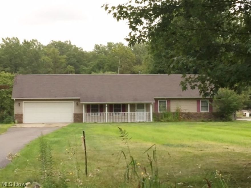 Three bedroom ranch situated on 1.46 acres in Perry. Large kitchen and family rm with an additonal living rm. 2.5 baths and tons of storage. Oversized two care attached garage and large outbuilding appr. 24x32 fenced in yard. This is a must see. Walk to park and lake. Very private setting.