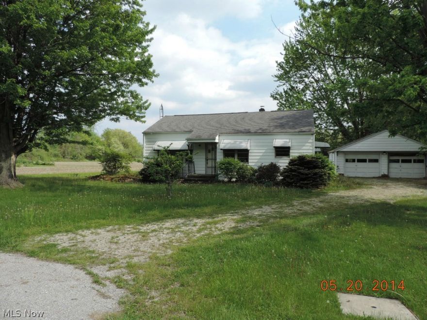 2 story 1 bath home located south of Port Clinton. Interior features include; formal dining room, laundry room, large closets, built in shelving, kitchen cabinets that go all the way to the ceiling and more! Exterior features include: .32 acre lot, oversized 2 car garage, mature trees, plenty of parking and more! Property is being sold AS-IS