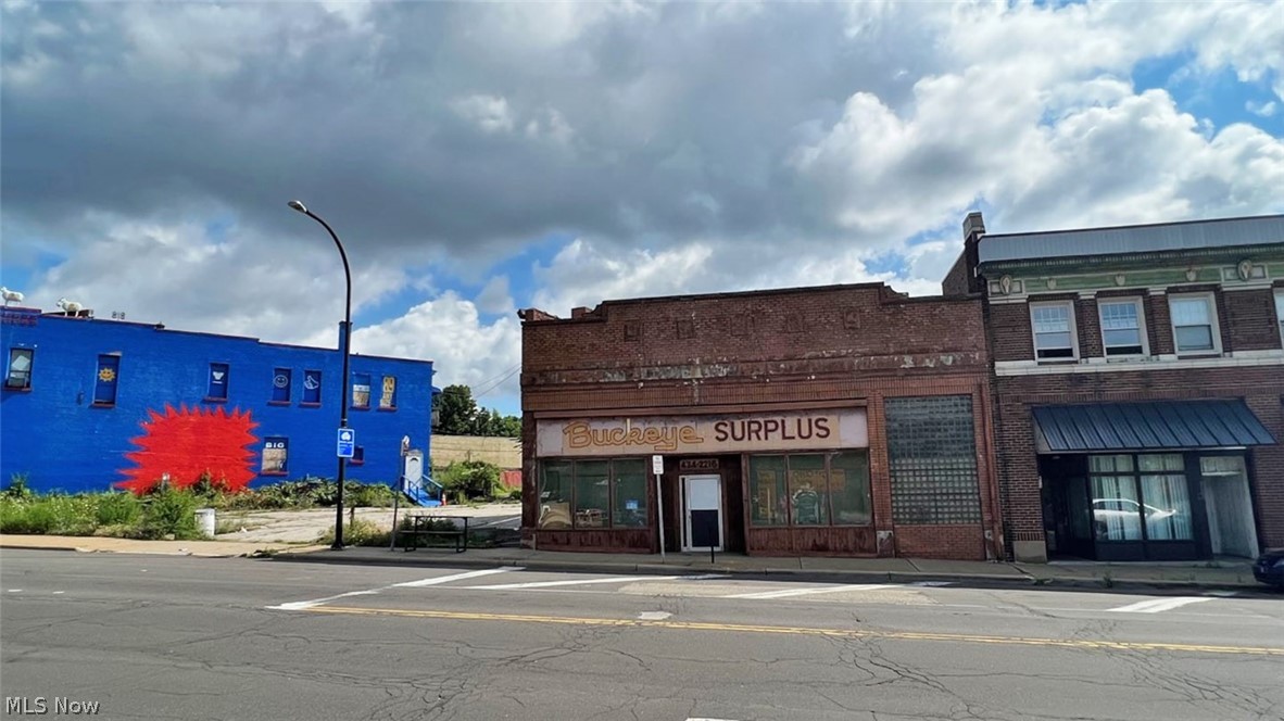 Commercial Property Opportunity - Retail/Office Bldg. – Formerly Buckeye Surplus - Large Traffic Count – Zoned U-3 - Summit Co. – Akron City - Online Bidding Available - All sells to settle the Frank Klansek Estate, Summit Co. Probate case #2022 ES 01283 on location. ONLINE BIDDING BEGINS MONDAY – JANUARY 9, 2023 – 12:00 PM and AUCTION LIVE ON-SITE BIDDING WILL BEGIN WEDNESDAY - JANUARY 11, 2023 - 12:30 PM. Property Features: 3,097 SF commercial retail/office building with a parking lot. Built-in 1900. Zoned U-3, Retail Business. Located on E. Market and Arlington. Good traffic count. Formerly Buckeye Surplus, Army/Navy store. Centrally located in the Middlebury neighborhood near Goodyear, hospitals, and the University of Akron. Billboard sign royalties. Summit Co. parcel #6828266 and #6837256. The property is ready for updates and handyman. The property will be open for viewing 1.5 hours prior to the auction. TERMS ON REAL ESTATE: 15% down auction day, balance due at closing. A 10% bu