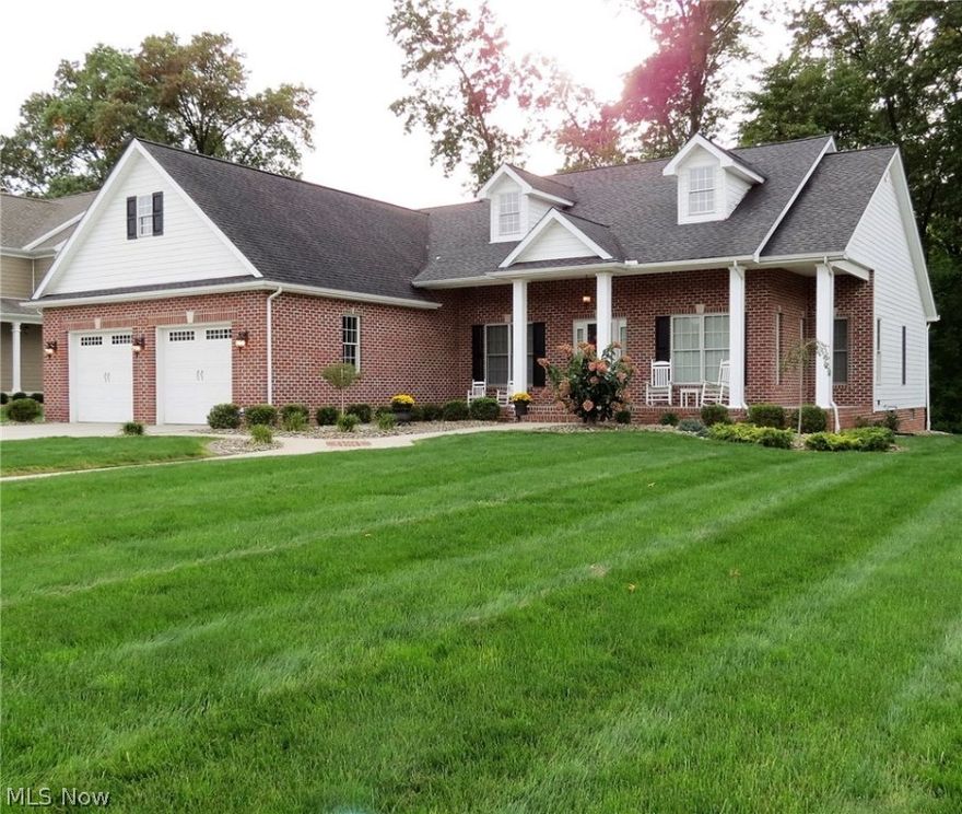 Stunningly beautiful, custom built 2457 Sq. Ft. ranch in Poland's sought after Ridgely Park development has an additional 2000 Sq. Ft. on the lower level. This home features an open floor plan and is loaded w quality upgrades. Charming covered front porch invites you in, beautiful open foyer w rich hardwood floors welcomes you. Spacious great room features 12 Ft. ceilings, a wall of windows, stone fireplace & plenty of space for entertaining or simply relaxing. Gourmet kitchen has room for multiple cooks w granite counter tops, large island, breakfast bar & eating area w lots of natural light. Formal dining room has lighted, tray ceiling & crown molding. Master suite encourages you to relax with a good book, or in your soaking tub at the end of the day. Nicely finished lower level includes an over sized family room, 4th bedroom, office, & another full bath, & could be used as an additional living suite. Perfectly situated in this quiet neighborhood on a professionally landscaped lot wi