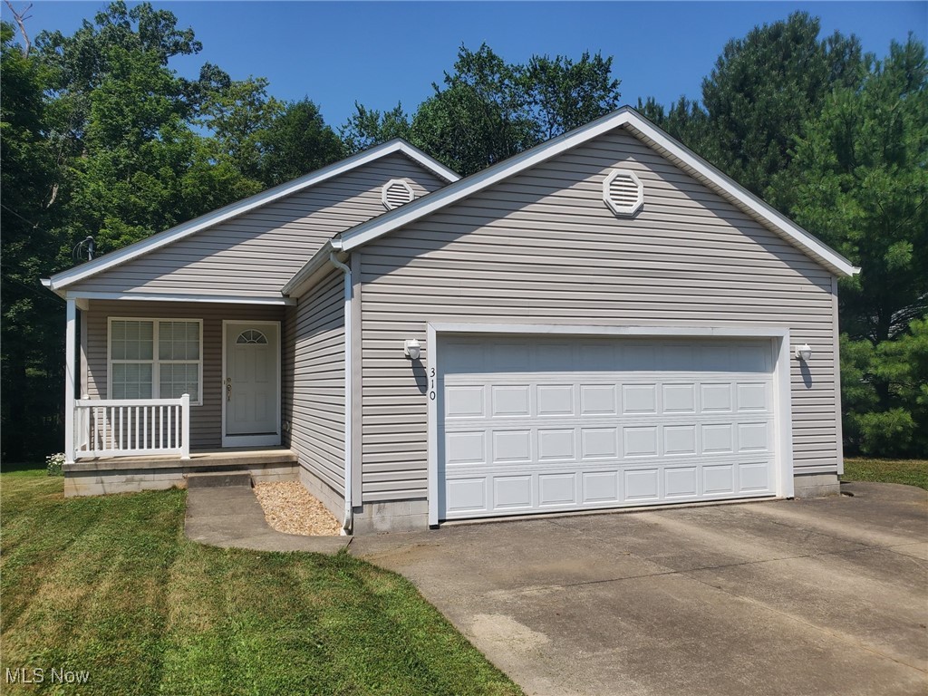 Nice find in Wadsworth! Welcome home to this 3 bedroom, 2 bath ranch with charming front porch, vaulted great room, open & applianced kitchen with breakfast bar & dining area and first floor laundry. Full basement features walk-out access, a laundry tub, a separate room for a workshop & lots of space. Enjoy the 2 car attached garage, deck off the side and view of trees in the back (Holmesbrook Park is behind the house!). Improvements (July 2025) include new hot water tank and garbage disposal. Move right in!
