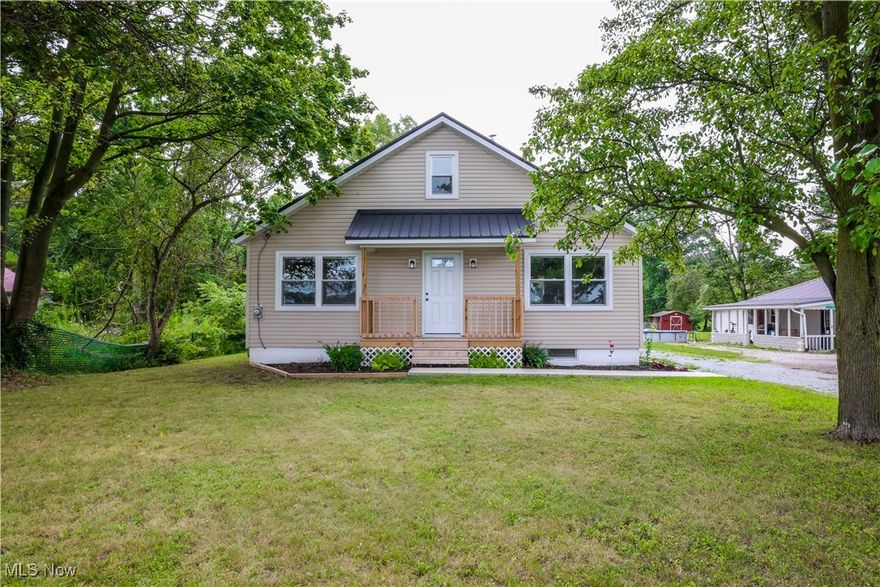 Discover this beautifully updated 3-bedroom, 1-bathroom home, offering nearly 1,400 square feet of modern living space. Recently renovated inside and out, it features new flooring, fresh paint, and a newer metal roof and vinyl siding. Nestled on 1.66 acres, the property includes a serene wooded area, with a small creek that runs toward the back, creating a peaceful retreat. A 24' x 32' detached 2-car garage, also with a new roof and siding, adds extra space for storage and convenience. Ideally located close to Apple Creek and Wooster, this home offers easy access to everything you need.  Contact us today for an opportunity to see this home!