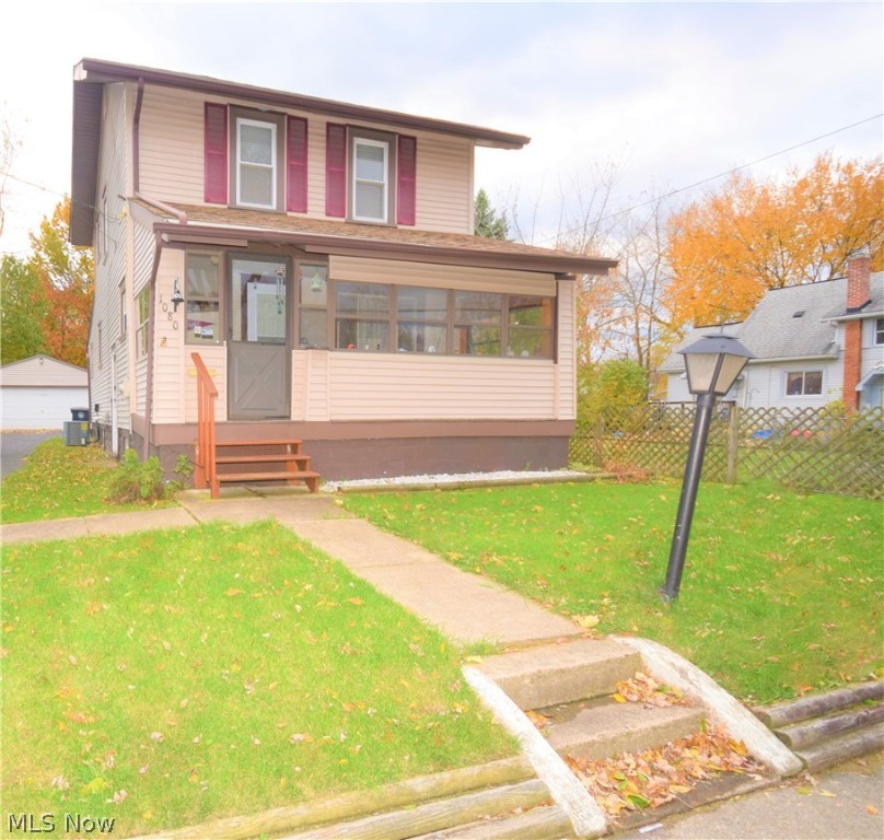 Well-maintained 2 bedroom, 1 bathroom Colonial home located in East Akron. The kitchen has plenty of convenient cabinet and counter space, which makes preparing and storing food easy. There is a dining room offering a perfect, open spot to sit and eat. The living room is a nice size, allowing you to have lots of seating for entertaining guests. This home also features a fully enclosed front porch, a family room with a bar off the kitchen, and a deck off the back door, Head upstairs to find the bathroom and two bedrooms. The owner's suite is extremely spacious, making it easy for you to arrange your furniture in a perfect way that suites you. This home has a detached, two-car garage and is conveniently located near I-76 and I-77.