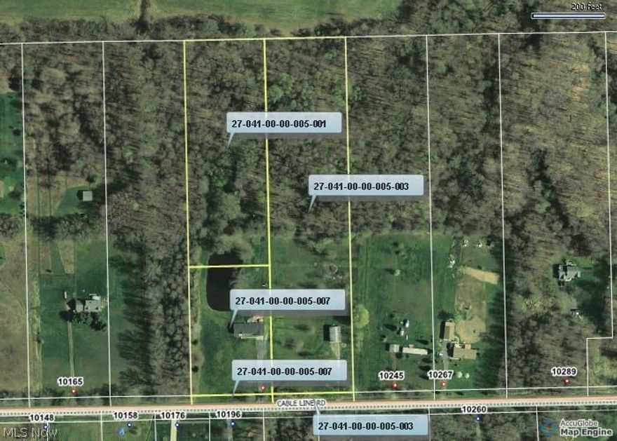 5.25 Acres of land with a 40x28 foot Pole Barn that was built in 1999.  Concrete floor, wired for electric and at one time was heated.