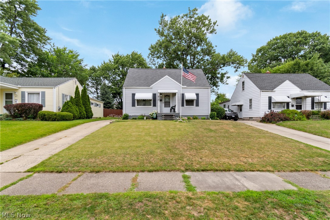 The pride of ownership shows in this meticulously cared for three bedroom home in Firestone Park. This bungalow is oozing with curb appeal with perfect positioned landscaping. The interior features a cozy living room with two bedrooms and full bathroom. Just off the kitchen is the great room, the perfect addition for entertaining! The third bedroom is upstairs and large in size, making a great primary bedroom, home office, etc. You will appreciate the finished basement for additional living space plus back area for storage and laundry needs. The backyard space is a tranquil oasis, with private patio and gardening area along with a one car garage to store your items out of the elements. There is nothing further to do but schedule your showing and make this cozy and inviting place home!