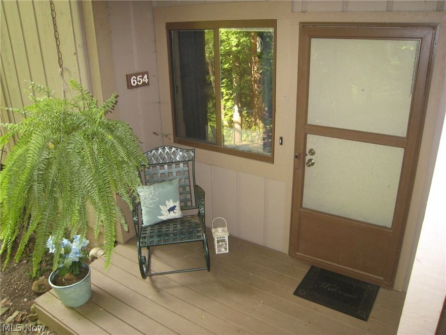 Maintenance free living at its best. This condo over looks the woods and a stream. Just sit on your covered deck and enjoy the peace and tranquility. The spacious living room has a wood burning fireplace. The kitchen floor has been updated and all the appliances are included. Enjoy the dining room as well as the extra living area that flows from the dining room. Plenty of room to entertain. There are 2 bedrooms, the master has its own full bath and two closets. a one car detached garage.There is also a pool.The HOA fee includes all utilities except electric. You can crank up the heat on those cold winter nights with no worries. This is a short sale. Contingent on banks approval on short sale