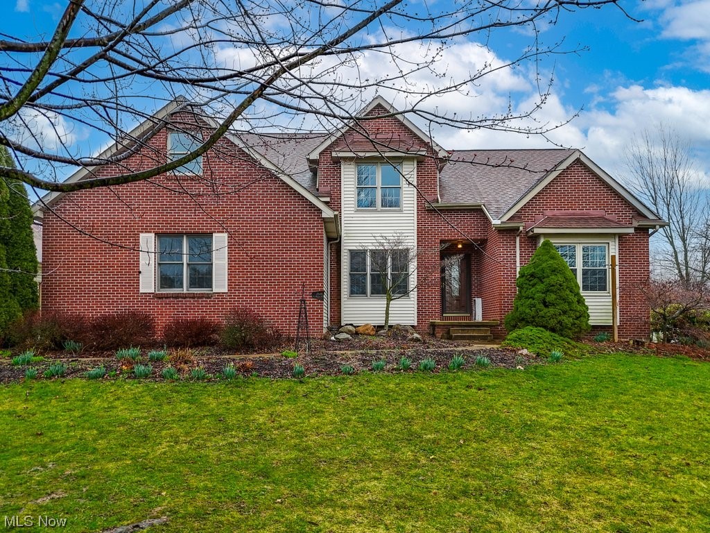 Welcome to this impressive 5 Bedroom, 3.5 Bath dream home in beautiful Wadsworth! Situated on over 2 acres, enjoy outdoor living and entertainment in the charming Sunroom surrounded by sliding doors opening to the wrap-around composite deck overlooking the backyard oasis featuring an Inground heated Pool and garden with a small potting shed. Step inside to discover the Open Floor plan redesigned in 2017 for a seamless flow between the Great Room with soaring vaulted ceilings accentuating the floor to ceiling brick fireplace flanked with a wall of windows and the spacious renovated Gourmet eat-in kitchen with Granite countertops, plentiful custom Cherry Cabinetry with soft close drawers, and a convenient breakfast bar. The first-floor Master suite features Hardwood floors, a cozy window seat, and dual closets. Pamper yourself in the Master bathroom complete with a corner garden Jetted tub, walk-in shower, dual sink vanity, and a walk-in closet. A formal dining room (currently used as a media room) rounds out the first floor. Head upstairs to four bedrooms, including one bedroom with an en-suite bath. The remaining bedrooms share access to another full bath. The 2nd floor also includes a Bonus room that could be used as a sixth bedroom, office or studio - your choice! In addition to the attached 2-car garage, the hobbyist will appreciate the large outbuilding capable of housing 4 cars or even a boat! Additional highlights include a Partially Finished Basement with a Rec room and abundant storage throughout, a First-floor laundry/mudroom, and a 1-year Home Warranty for the Buyer's peace of mind (Pool coverage included). Plus, enjoy the convenience of a newer H2O heater (1 y/o), tear-off roof and HVAC (both ~10 years). Located in the highly-rated Wadsworth City School District and with easy access to I-76 and I-71, this home also offers proximity to River Styx Park and Ridge Top Golf Course. Don't miss the opportunity to make this your forever home!