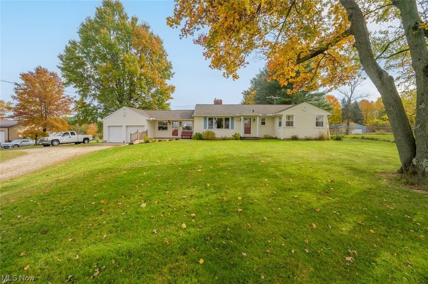 Welcome home to 4322 Mogadore Road! This beautiful 4 bedroom 2 bath ranch home has been well maintained, moved in ready! The large breezeway hosted many birthday/holiday gatherings. Partially finished basement could be used as a rec room or office space. Host all of your summer events in your own backyard! 3 acres with a large pavilion and an outbuilding. 2 car attached garage, outbuilding has room for multiple vehicles or equipment with a 5 ton crane. So many possibilities with this home!