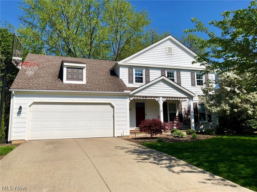 Fabulous colonial on cul-de-sac location highlights numerous updates/improvements including newer vinyl planked flooring ('18) throughout the entire first floor and rec room.  Charming covered front porch leads to gracious open foyer. Bright formal living room. Gourmet kitchen boasts SS appliances, quartz countertops, center island/breakfast bar (2), ceramic backsplash, recessed and pendant lighting, wall of pantry closets, and inviting dining area with wainscoting and crown molding.  Nearby access door  to outdoor patio.  Engaging and partially vaulted family room features brick woodburn fireplace w/gas starter and view of second floor loft. Updated guest bath and laundry room conveniently located on the first floor.
Master bedroom suite features renovated glamour bath with extra large shower & ceramic tile, dressing table, and WIC.  Two additional generous sized bedrooms, renovated main bath, and spacious loft area (could be 4th bd) with skylight, complete the second floor. Partiall