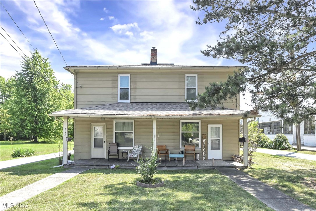 Fantastic, rare opportunity in the heart of Madison Village! This well-maintained side-by-side duplex is perfect for an owner-occupant looking to offset housing costs or for a full-time investor. The property offers a spacious horseshoe driveway, a 5-car garage, and 4 additional parking spaces—ideal for tenants or when entertaining guests. The north unit features 2 bedrooms, 1.5 baths, and has been thoughtfully updated since a full renovation in the 1990s. New carpet was installed in 2025, along with a new water tank, and new furnace motor. The south unit has been completely renovated from down to the studs within the last 2 years and includes 2 bedrooms and 2 full baths. Major updates include all new Window World windows (2022), drywall and insulation, all new electrical ( with both units having new electrical service panels), HVAC system, tankless water heating system and a new roof (2022), flooring and appliances. Durable steel siding ensures low-maintenance exterior care. The shared basement features glass block windows and a professionally installed OSW waterproofing system (back wall only). This Maintenance Free gem is set to impress.