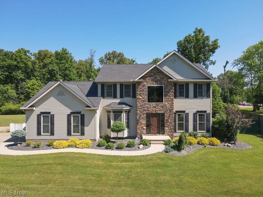 This beautiful home was built in 1999 by Paul Schumacher Homes and is situated on nearly an acre of land.  The inground backyard pool setting offers a uniquely safe, quiet and private get-away that is hard to find in any city at this price.  The 4th of July and Carnation Days fireworks displays can be watched from the front yard and a short, five-minute walk will have you enjoying all of the amenities of Silver Park.  It is also close to the Alliance Middle School, Rockhill Elementary School, the University of Mount Union, the Iron Horse Trail and the Alliance Country Club. A home alarm system and perimeter cameras will always provide reassurance that all is well.  This is a happy home. Your perfect stay-cation and little piece of Heaven! 4 bedrooms, 2 1/2 baths, updated kitchen w/granite. 1st floor laundry room, gas fireplace, fenced in yard. Large bedrooms with ample closets and storage. Updated mechanicals, beautifully decorated, plus much more! You really need to see it to appreciate all this home has to offer.