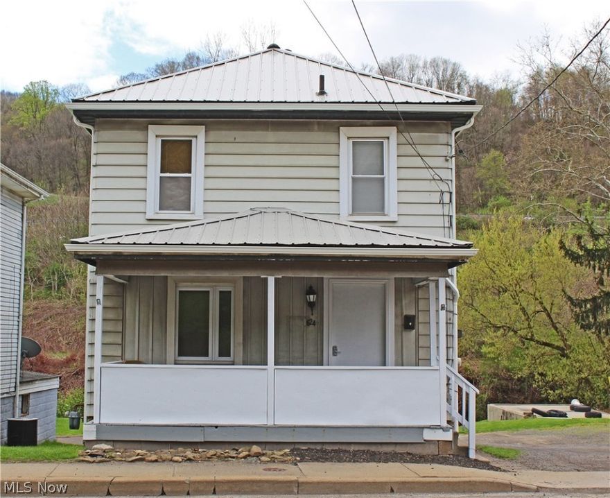 A rare find! This three bedroom home is clean as a whistle AND affordable! Features include: new metal roof, newer flooring throughout, beautifully updated bathrooms, and a bright and cheery sun room. Don't wait-call today!