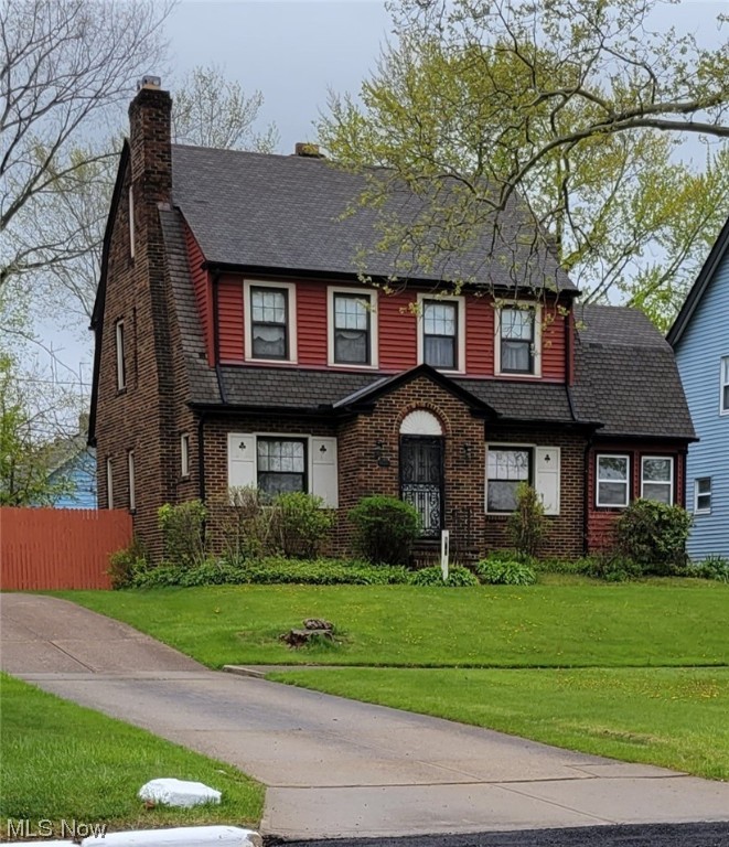 Are you looking for a large brick colonial home to spread out from being jam packed? Here it is, right on the Boulevard, Martin Luther King Blvd. The home opens into a nice size foyer then to the huge living room with book shelves that surround the fireplace. At one end is a sunporch to read and relax from your successful day. Oh, there is another sunporch on the second floor but lets see the roomy dining room with corner cabinets to show off your special items. The eat in kitchen has an island and a breakfast nook. There are plenty cabinets and all the area for a gourmet cook. Just as you go to the 2nd floor there is a butler entry. 3 bedrooms on the 2nd floor and a bathroom just right for a large family. The 3rd floor has an addition living /bedroom and a cedar closet for the special things. Oh, did I tell you there is a half bath on the first floor? When you go out the back door there is a porch to check out your back yard and the 2 car garage. Now the owner is selling ---"AS IS" --- so bring your offer.