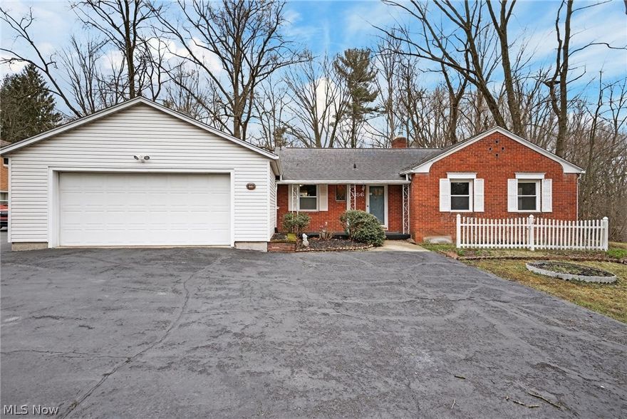 Welcome home to this charming 3 bed, 2 bath ranch sitting on 0.74 acres. The main floor offers 3 bedrooms and a full bath, along with hardwood floors throughout most of the home and LVP in the kitchen. The living room has a beautiful picture window that brings in tons of natural light, plus a gas fireplace that makes the space feel warm and welcoming. The kitchen has plenty of cabinet space, stainless steel appliances, and convenient access to the 2-car garage with workshop area. The partially finished lower level adds even more flexibility, with a bonus room, a full bath, and an unfinished area with walkout access. The screened-in back porch is a wonderful spot to unwind, and it connects to both the home and the 2-car garage for added convenience.

Short distance from shopping and restaurants. 

With a little TLC and your own personal touch, this home has so much potential to become something truly special. Schedule your showing today!