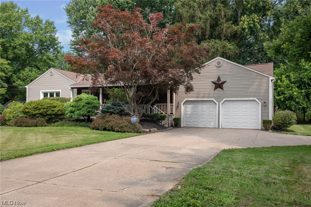 A ranch on over 2 acres in Perry Twp! The home has a big front porch for enjoying morning coffee. Once inside, you enter into a foyer that opens to a spacious living room. There is a separate dining area that connects to the kitchen which overlooks the rear yard. There is a large pantry for extra storage. The home has 2 nice sized bedrooms on the main floor and a full bath. There is an attached sunroom with gas fireplace. The basement offers tons of additional square footage including two rooms that were previously used as bedrooms (currently a bedroom and office), a workshop and a large storage area / laundry space. The 2 car attached garage is oversized and there is also a large additional outbuilding with one car garage door and a large walk up loft area. The home has a nice patio for entertaining and the big lot has a couple trails and a wooded area. The home has had many recent updates including the septic was replaced in 2022, roof on outbuilding in 2019, home approx 12 years, so