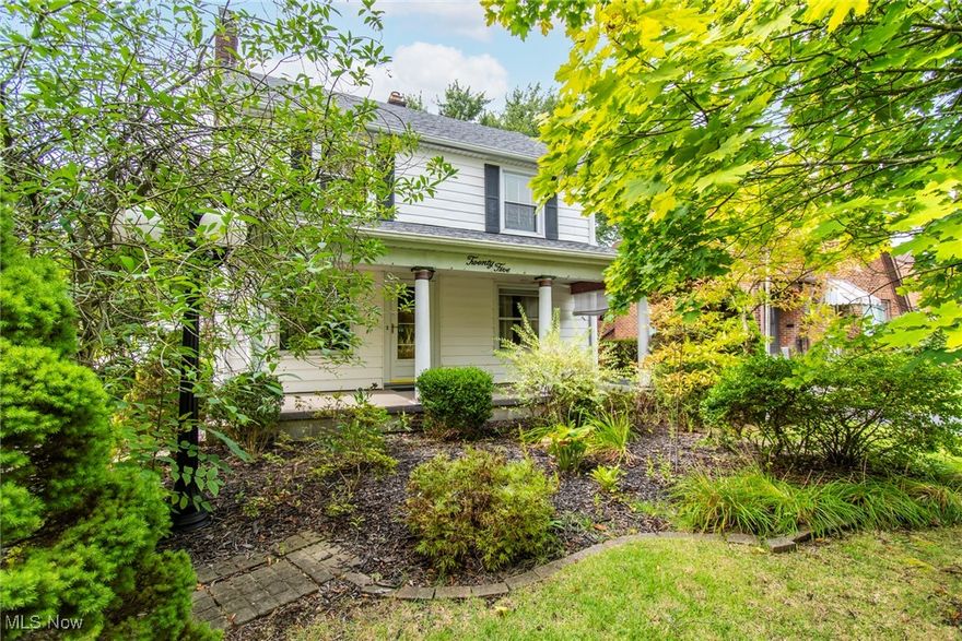 Welcome to this lovely three bedroom and one and a half bath home that exudes character and charm! Step through the original front door (complete with skeleton key) to the spacious living room which features a picture window for abundant natural light and cozy brick gas fireplace. The formal dining room offers an ideal setting for gatherings and special occasions. The heart of the home is the large, updated kitchen, thoughtfully designed with skylights and sliding doors that lead to a private back deck. Enjoy outdoor dining thanks to the dedicated gas line for your grill! Throughout the home you'll find neutral carpet over hardwood floors and gorgeous original woodwork, doors and glass door knobs. Upstairs, you’ll find three comfortable bedrooms and a full bath. There is built-in shelving for linens and convenient laundry chute that makes managing laundry a breeze. The partially finished basement includes a half bathroom plus separate shower, laundry area and additional space for recreation or storage. The property also boasts an oversized detached two-car garage with electricity and work area. The private and peaceful backyard is filled with many perennial plants that cut down on your mowing time and keep the yard beautiful year round. Updates include hot water tank 2022 and the roof is less than 5 years old. This gem is located only a few minute walk from Handel's Ice Cream, shopping and schools!