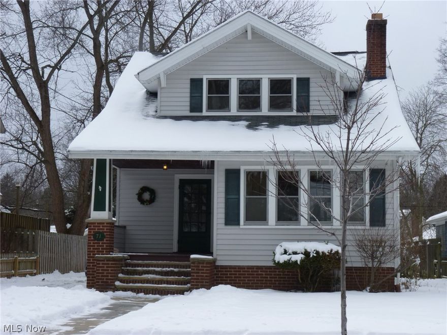 Enjoy the charm of this Berea Beauty with it's welcoming covered front porch, hardwood floors & wood molding throughout!  This 3 bedroom, 2 full bath Colonial home is well-cared-for with over 1730 square feet, an unfinished basement and is located on a desirable street near the center of Berea!  The living and dining rooms boast built-in cabinets & shelving, fireplace--both are spacious and open.  Off the living room, could be an office/sun room with tons of windows and decorative doors!  Kitchen refrigerator, stove and dryer will stay! Vinyl siding, new hot water tank (2014), transferrable Ohio State lifetime warranty for basement waterproofing too! Basement has a full bath, and lots of room for storage and possible finishing.  A 2 car garage with nice back yard is almost completely fenced!