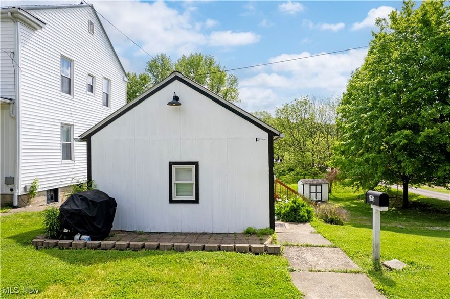 Charming In-Town Tiny Home – Turnkey Vacation Rental!
Discover the charm of small-space living with big-time appeal! This fully furnished tiny home has been a successful vacation rental, offering guests a cozy and comfortable escape with all the right features. Set on a manageable in-town lot, this 20’ x 16’ open-concept space features a bright and airy layout, with combined living, sleeping, and kitchen space, plus a full bathroom — all thoughtfully arranged for comfort and function. Outside, a private deck and gas fire pit create the perfect spot for relaxing or entertaining, while the detached one-car garage and shed provide valuable storage.
Located just minutes from local attractions, the scenic Mohican River,  nature trails, and dining, this turnkey property is ideal as a weekend retreat, investment rental, or low-maintenance living option. Don’t miss this unique opportunity to own a fully equipped tiny home, with proven rental income potential!