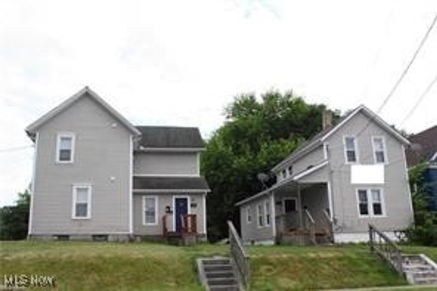 Don't miss this amazing opportunity to own this 3 unit rental property located near the University of Akron. This property consists of  1 two unit and 1 single family house on one parcel, plus an additional parcel for parking. Addresses include 590 Sumner and 596 Sumner. Owner pays utilities with a utility cap. Recent improvements include a new hot water tank 2024, new paint 2020, new flooring 2019, new surround tub 2021. The single family unit is rented, but the other 2 unit is vacant. The list price is below the appraised value. Please call to schedule a showing.