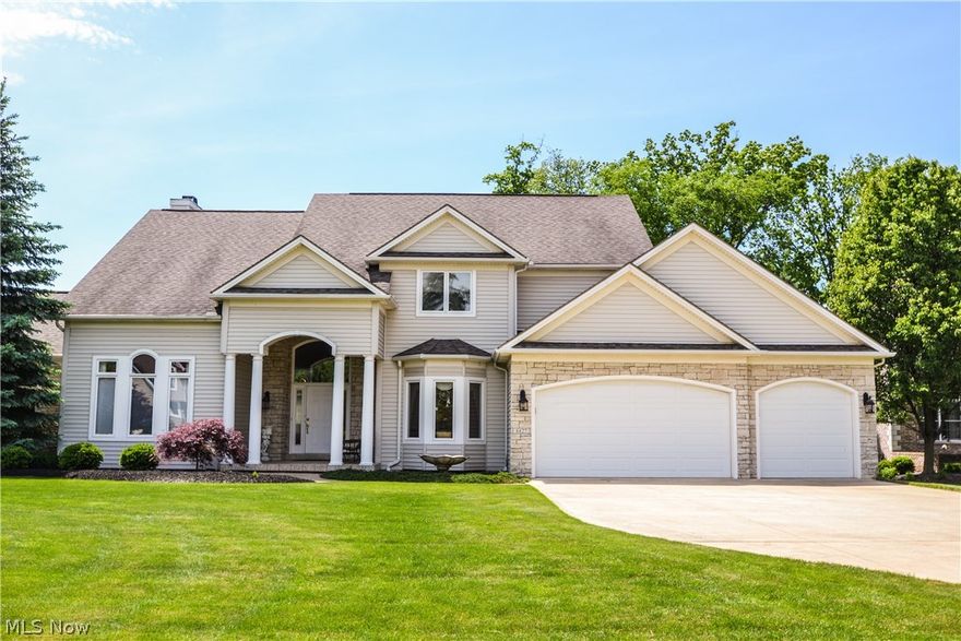 Serene and stately describes this lovingly cared for Cape in this lovely development.As you enter the home the spacious foyer greets you with its gleaming hardwood floor.  Built in 2000 this spacious home has high ceilings throughout the first floor. The first floor master has a 10 foot tray ceiling and the master bath features a whirlpool tub, dual sinks and a large walk in closet. The great room has built in shelving units custom made for this space. There is also an entertainment table made to match and can stay if the buyer requests it. The large wall of windows overlook the private rear yard with an impressive patio featuring the Mandarin symbol for prosperity in the center.  The large spacious kitchen has an oversized panty and for the cook there is a center island with granite. Abundant counter space accented by a cook top stove and double ovens for baking. All appliances stay. There is a first floor laundry room with washer and dryer included. Up the winding staircase is a spac