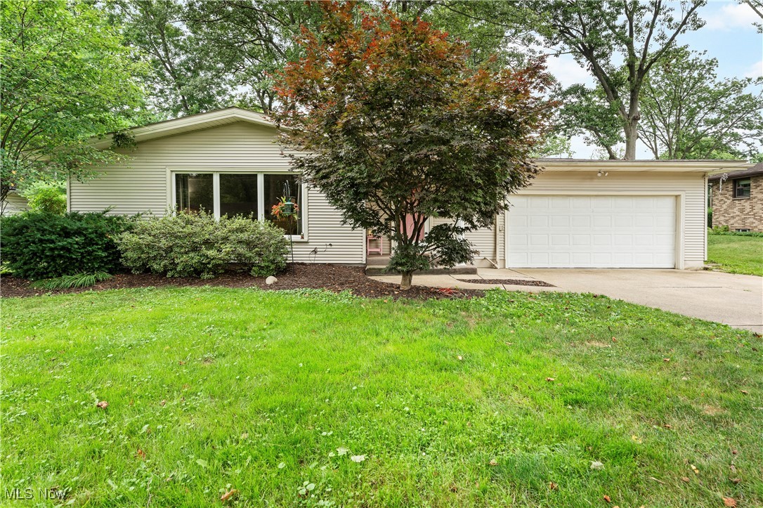 This three-bedroom ranch-style home offers a perfect blend of comfort and modern amenities. The spacious living room features large windows that fill the area with natural light, creating an inviting atmosphere. The home maintains a distinct layout, providing ample space without an open floor plan, allowing for privacy and functional living. The renovated bathroom offers contemporary fixtures and finishes, enhancing the home's appeal. Additionally, the property features a brand-new roof, ensuring durability, while a newer furnace and air conditioning system provide efficient climate control year-round. Ideal for families or anyone seeking a cozy yet updated home.