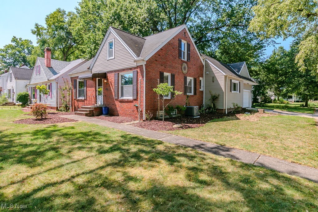 Classic, expanded 4 Bedroom, 2 full Bath Bungalow with a large Basement & 2-car attached Garage on a nice corner lot with a private rear yard. The main floor has a large carpeted Living Room which flows into the Dining Room with built-ins and tile floor. The Kitchen has the same tile floor, white cabinets and ss appliances. The newer Primary Suite offers privacy with gleaming hardwood floors, large windows and its own bathroom with a corner shower, tile floor and a nice vanity. Spacious Bedroom 2 has wood-look laminate flooring. The main Bathroom was remodeled with a large fiberglass shower and pedestal sink. The 2nd floor features 2 additional Bedrooms, one with a unique wall with open shelving which could make a great Study or Office as well. The large Basement could be finished for additional living space. The Laundry area includes a washer & dryer. Step out the back door onto the private 420 s.f. paver Patio and enjoy your morning beverage or kick back, relax and grill dinner for your friends. The attached 2-car Garage is accessed from the Patio as well. Fresh paint & carpet, new furnace & water heater (2025). Windows replaced approx. 2006.